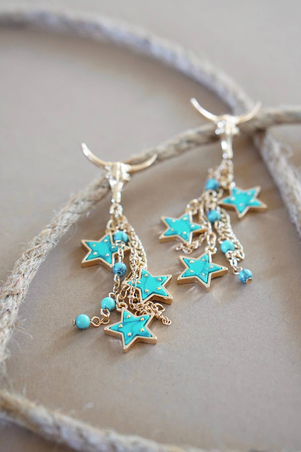 Steer Skull Star Earrings in Shiny Gold